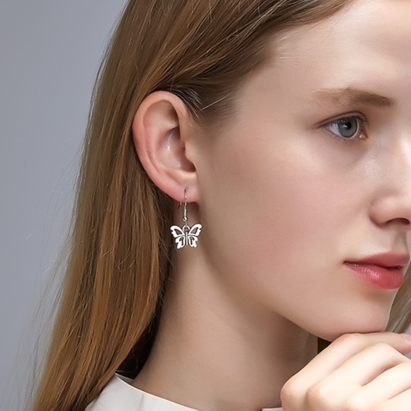 GlitzBlitz Boutique Jewelry - Any 4/$25! Silver Butterfly Drop Earrings